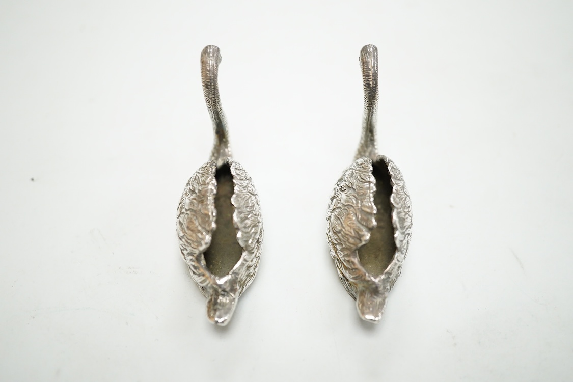 A pair of modern silver swan menu holders, maker E.A.W., Birmingham, 1975, height 44mm.